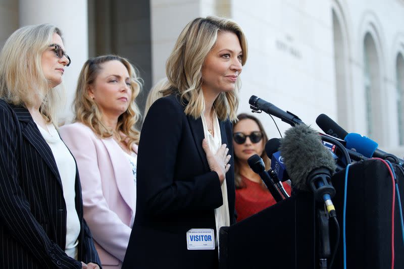 Katherine Kendall speaks with "The Silence Breakers", a group of women who spoke out about Harvey Weinstein's sexual misconduct during a news conference outside Los Angeles City Hall in Los Angeles