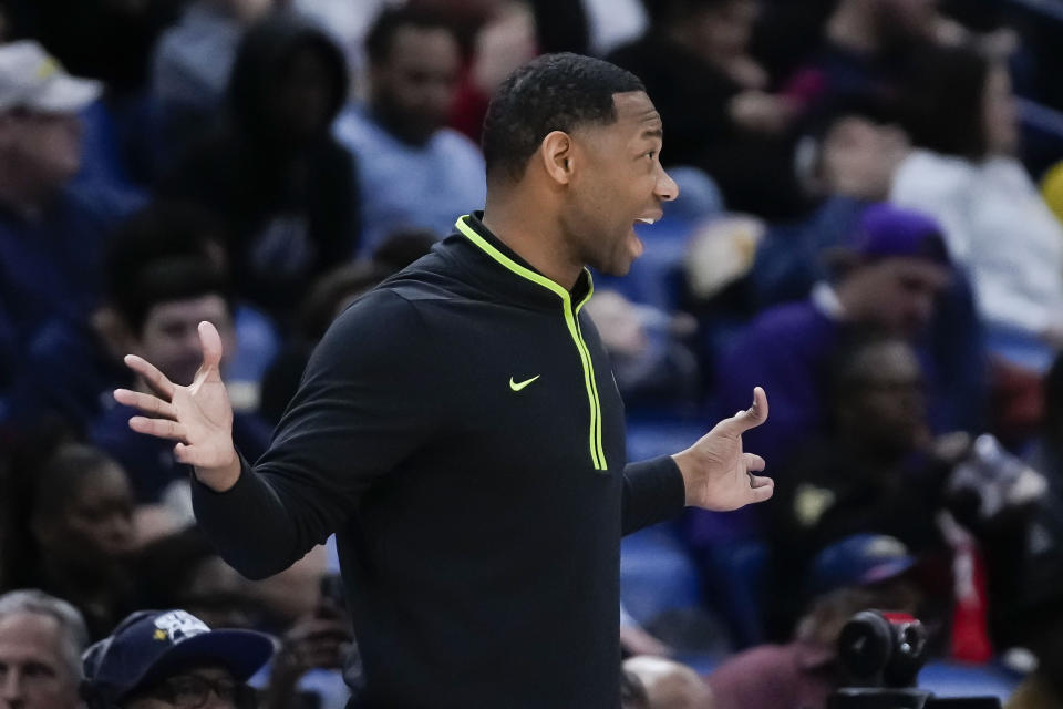 New Orleans Pelicans head coach Willie Green calls out from the bench in the second half of an NBA basketball game against the Brooklyn Nets in New Orleans, Tuesday, Jan. 2, 2024. The Pelicans won 112-85. (AP Photo/Gerald Herbert)