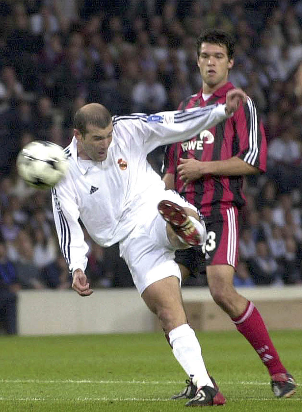 FILE - In this Wednesday, May 15, 2002 file photo Real Madrid's Zinedine Zidane scores the winning goal watched by Bayer Leverkusen's Michael Ballack during the UEFA Champions League final soccer match at Hampden Park in Glasgow, Scotland. Z is for Zinedine Zidane. Zidane was one of the games all time greats and this goal that he scored against Leverkusen in the 2002 final one of the greatest goals to grace a final. (AP Photo, File)