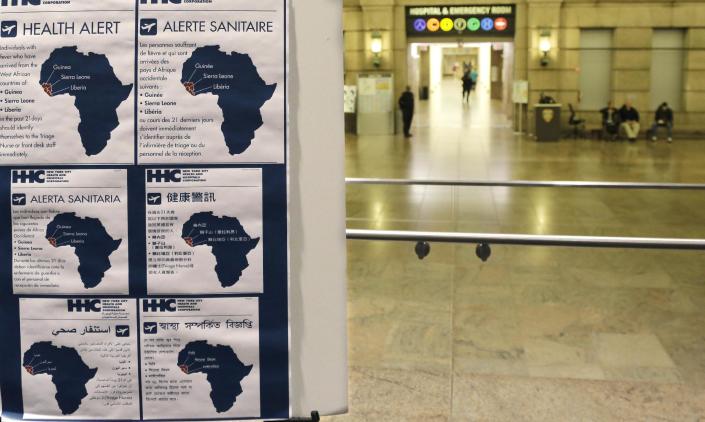 Health alerts regarding people who may have traveled to particular West African countries are posted in the lobby of Bellevue Hospital, Friday, Oct. 24, 2014, in New York. Dr. Craig Spencer, a resident of New York City and a member of Doctors Without Borders, was admitted to Bellevue Thursday and has been diagnosed with Ebola. (AP Photo/Mark Lennihan)