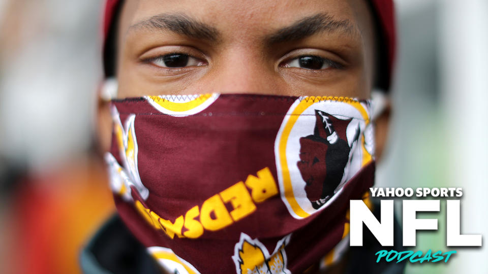 A Washington Redskins fan wears a mask in public amid the thread of COVID-19. Has the NFL's public stances in response to Coronavirus been tone-deaf? Charles Robinson & Terez Paylor discuss on the latest Yahoo Sports NFL Podcast. (Photo by Chip Somodevilla/Getty Images)