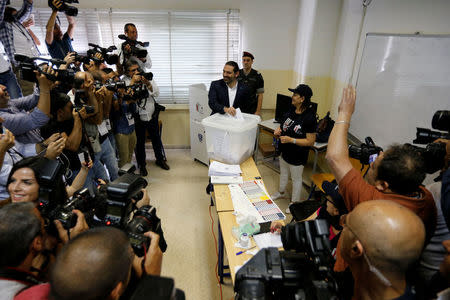 Lebanese prime minister and candidate for the parliamentary election Saad al-Hariri casts his vote at a polling station during the parliamentary election in Beirut, Lebanon, May 6, 2018. REUTERS/Jamal Saidi