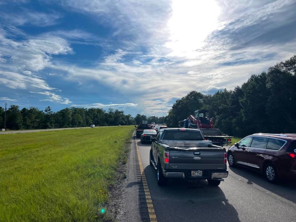 Traffic on Highway 90 near Pearlington sits at a standstill as drivers try to access Interstate 10 near the Mississippi-Louisiana state line in Hancock County on Wednesday, July 5, 2023.