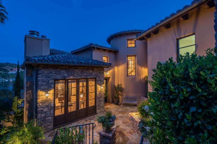 The Lake Sherwood home of KISS lead guitarist Tommy Thayer features six balconies, five fireplaces and nearly 4,500 square feet of space. Asking price: $2.75 million. <span class="copyright">(Jeff Elson)</span>