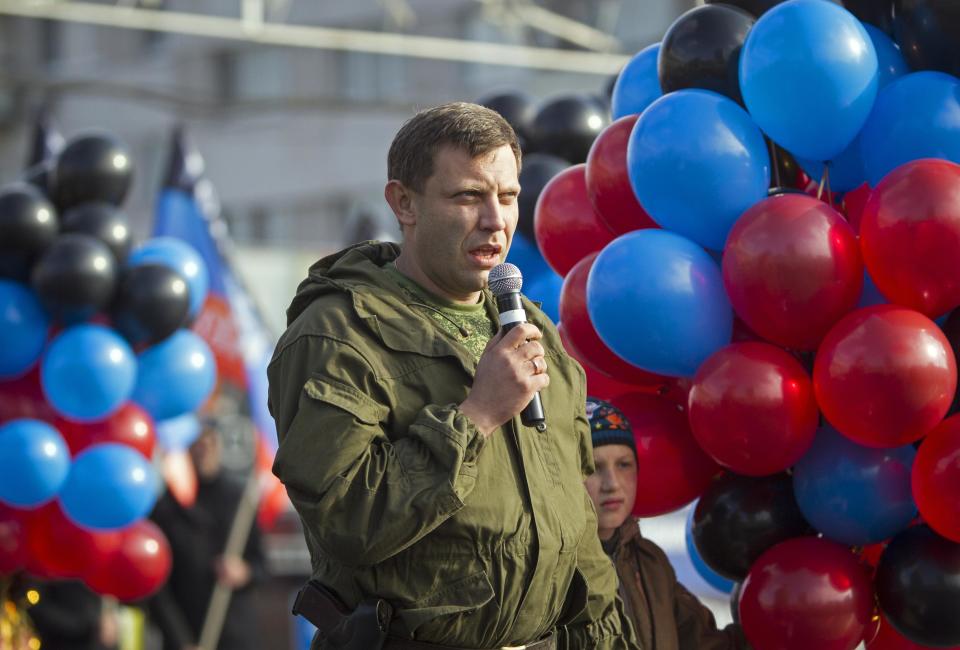 Prime Minister of the self-proclaimed Donetsk People's Republic Alexander Zakharchenko speaks during a rally at Lenin Square in the centre of Donetsk, eastern Ukraine, October 19, 2014. A rally was organised to mark the Day of the Flag of the Donetsk People's Republic. REUTERS/Shamil Zhumatov (UKRAINE - Tags: CIVIL UNREST POLITICS)