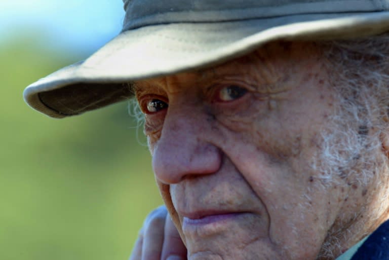 Chilean poet Nicanor Parra, who has died at age 103, is pictured during a July 2004 celebration of the birthday of fellow countryman and Nobel laureate Pablo Neruda