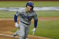 Los Angeles Dodgers' Enrique Hernandez elebrates a RBI-double against the Tampa Bay Rays during the sixth inning in Game 4 of the baseball World Series Saturday, Oct. 24, 2020, in Arlington, Texas. (AP Photo/Eric Gay)