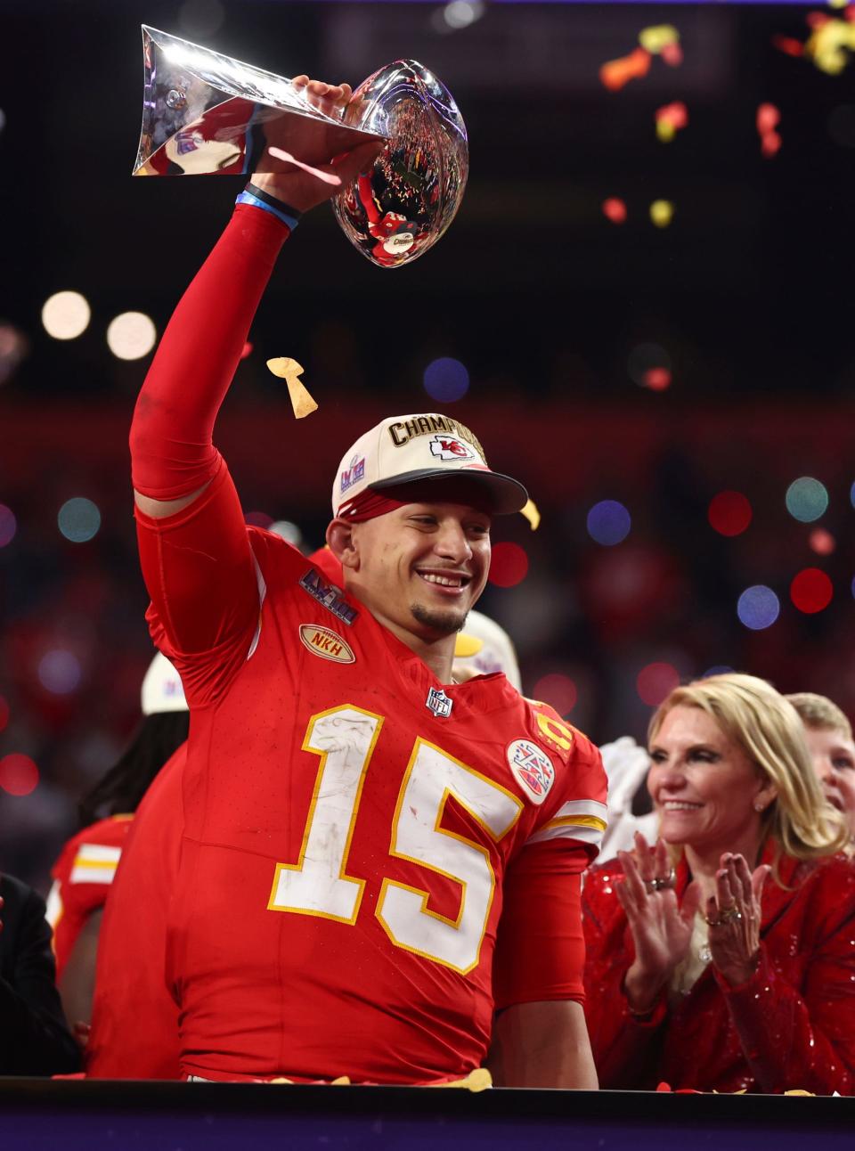 Chiefs quarterback Patrick Mahomes celebrates with the Vince Lombardi Trophy after the Chiefs' 25-22 overtime win in Super Bowl 58 on Sunday, Feb. 11, 2024, in Las Vegas.