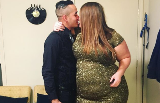 Melissa Gibson and her boyfriend ring in the new year with a kiss. (Photo via Instagram/yourstruelymelly)