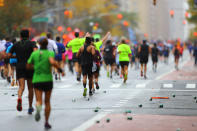 <p>A pack of runners reach First Ave. just past mile 16 of the 2017 New York City Marathon, Nov. 5, 2017. (Photo: Gordon Donovan/Yahoo News) </p>