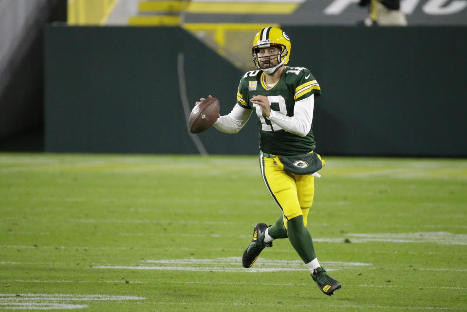 Green Bay Packers quarterback Aaron Rodgers (12) looks to throw during the second half of an NFL football game against the Atlanta Falcons, Monday, Oct. 5, 2020, in Green Bay, Wis. (AP Photo/Mike Roemer)