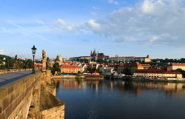 Prague castle seen from Charles bridge (John Walton/PA)