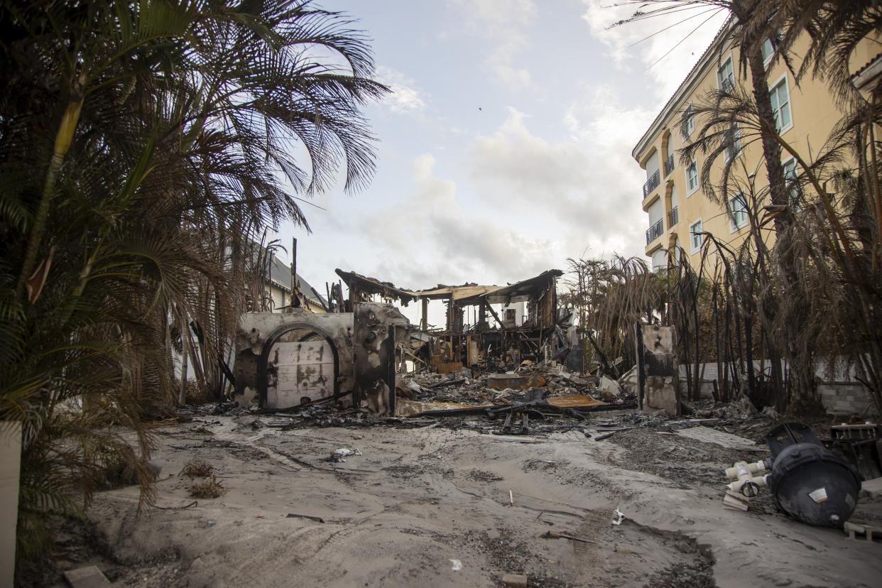 A home completely destroyed by fire due to Hurricane Helene is pictured on Saturday, Sept. 28, 2024, in Madeira Beach, Fla. (Luis Santana/Tampa Bay Times via AP)