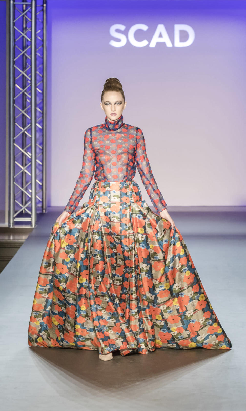 SCAD Graduate Jeffrey Taylor’s unapologetically romantic designs were an audience favorite. “He could get a job at Oscar [de la Renta] tomorrow,” one well-known fashion editor exclaimed as this dress swanned down the runway.