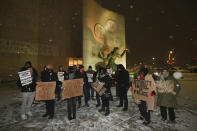 Demonstrators attend a protest in front of the Spirit of Detroit in Detroit, Friday, Jan. 27, 2023, by the Party for Socialism and Liberation over the death of Tyre Nichols. (Daniel Mears/Detroit News via AP)