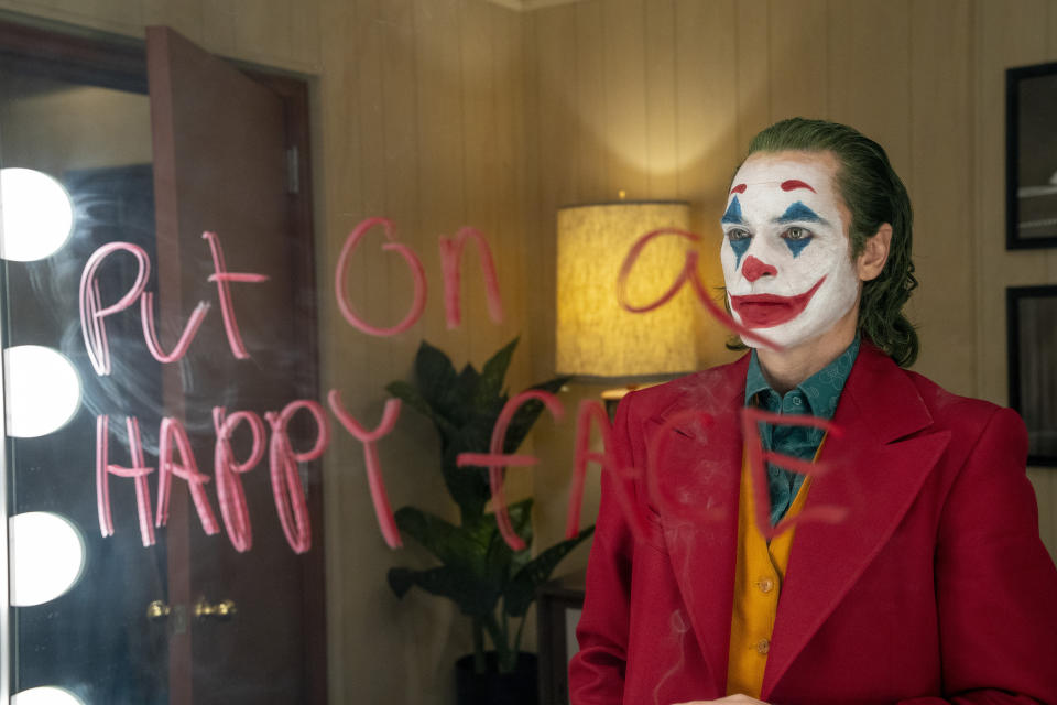 This image released by Warner Bros. Pictures shows Joaquin Phoenix in a scene from "Joker," in theaters on Oct. 4. (Niko Tavernise/Warner Bros. Pictures via AP)