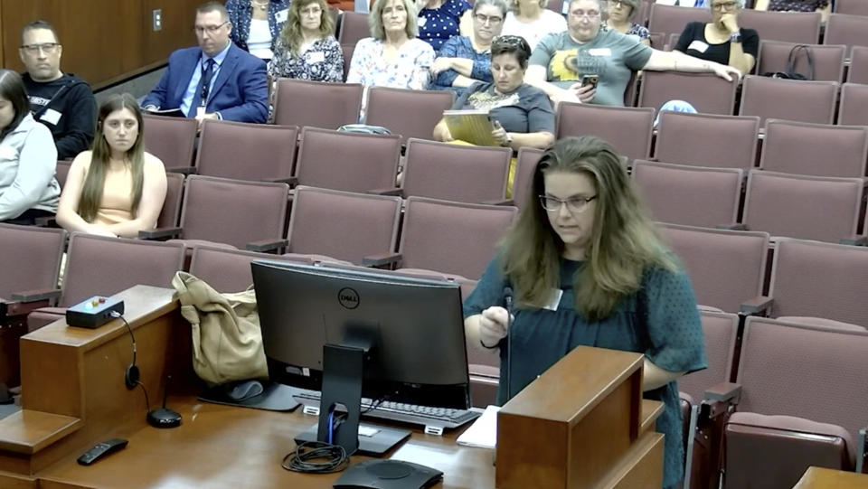 In this image from video posted by the Forsyth County school board, Allison Strickland speaks during a meeting of the board in Cumming, Ga., on June 20, 2023. A parent of two West Forsyth High School students, Strickland filed complaints in March, attaching excerpts from BookLooks, a conservative website that highlights passages from books that its writers consider objectionable. (Forsyth County Schools via AP)