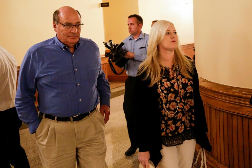 Kristine Barnett leaves court after an initial hearing Sept. 27 in which a plea of not guilty was entered in response to charges that she abandoned her adopted daughter in 2013.