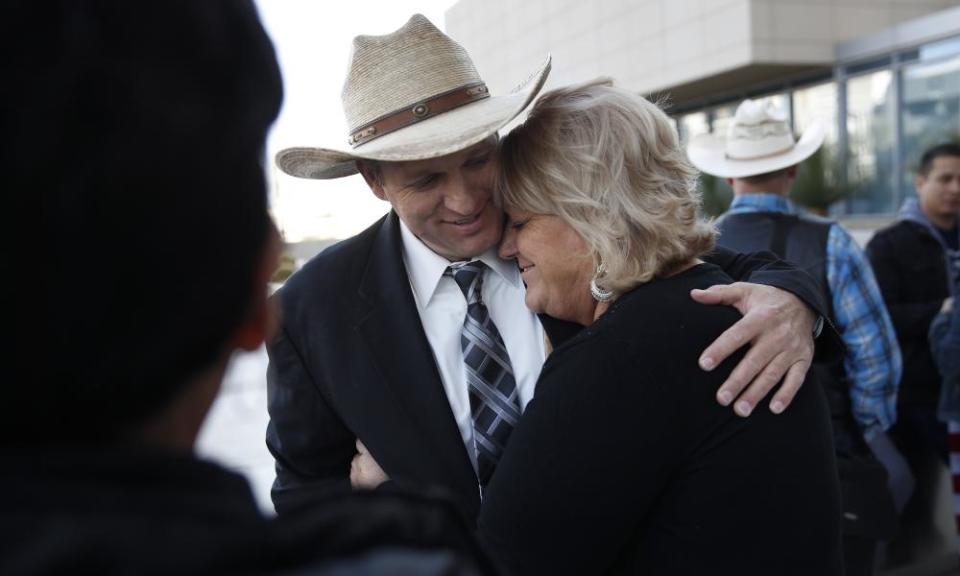 Ammon Bundy hugs is aunt Lillie Spencer outside a federal courthouse in Las Vegas on 20 December. All charges were dismissed Monday. 