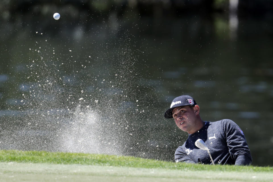 Gary Woodland hits from a bunker on the sixth hole during the second round of the Honda Classic golf tournament, Friday, Feb. 28, 2020, in Palm Beach Gardens, Fla. (AP Photo/Lynne Sladky)