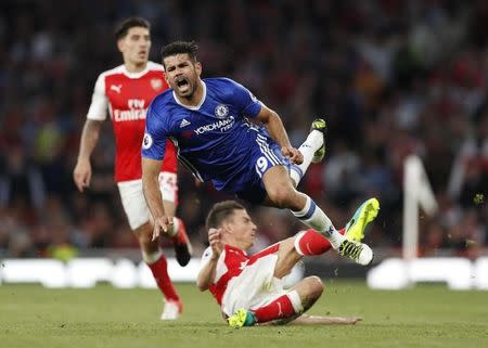 Britain Football Soccer - Arsenal v Chelsea - Premier League - Emirates Stadium - 24/9/16 Chelsea's Diego Costa in action with Arsenal's Laurent Koscielny Action Images via Reuters / John Sibley Livepic