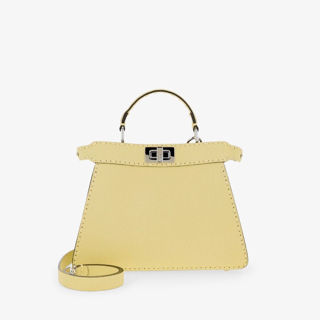 <p><a href="https://www.fendi.com/us-en/woman/bags/peekaboo-iseeu-small-yellow-selleria-bag-with-556-hand-sewn-topstitches-8bn327arbbf1nq1" rel="nofollow noopener" target="_blank" data-ylk="slk:Shop Now;elm:context_link;itc:0;sec:content-canvas" class="link rapid-noclick-resp">Shop Now</a></p><p>Peekaboo ISeeU Small</p><p>fendi.com</p><p>$5900.00</p>