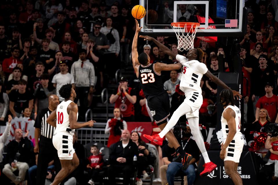 Oklahoma State freshman Brandon Garrison (23), pictured against UC on Feb. 21, 2024, averaged 7.5 points per game last season for the Cowboys. Xavier is on a short list of suitors for the 6-foot-11 center.