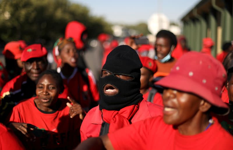 Members of the Economic Freedom Fighters (EFF) protest outside the Senekal magistrate's court