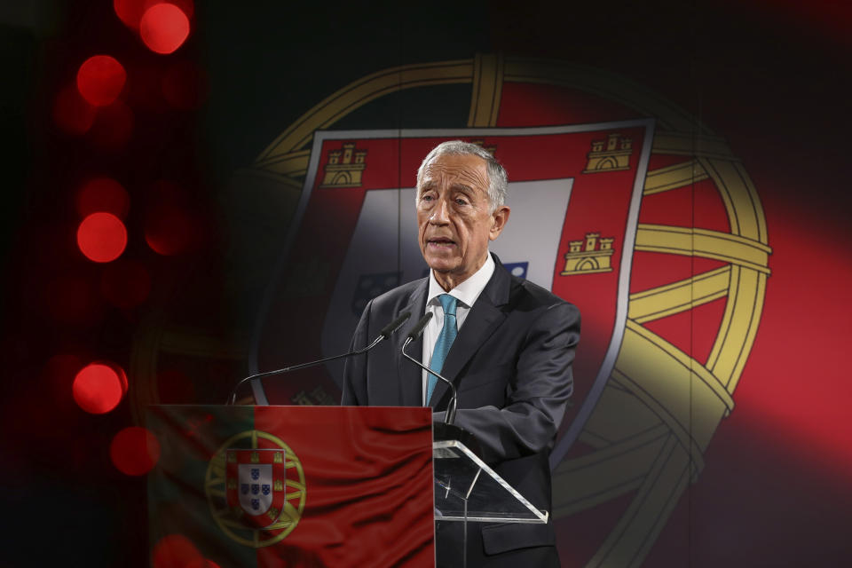 Portuguese President Marcelo Rebelo de Sousa announces that he will be running for reelection in the Jan. 24 presidential election, in Lisbon, Portugal, Monday, Dec. 7, 2020. Portugal holds a presidential election on Sunday, Jan. 24, 2021 and the moderate incumbent candidate is widely seen as the sure winner. But an intriguing question for many Portuguese is how well a brash new populist challenger fares in the ballot. Mainstream populism is a novelty in Portugal. (Manuel de Almeida/Pool via AP)