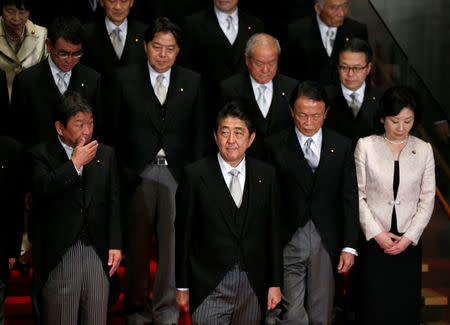 Japan's Prime Minister Shinzo Abe and his cabinet ministers attend a photo session at Abe's official residence in Tokyo, Japan November 1, 2017. REUTERS/Toru Hanai