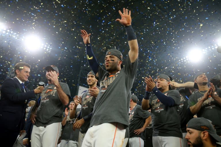 Jose Altuve of the Houston Astros celebrates after defeating the New York Yankees to win game seven of the American League Championship Series, at Minute Maid Park in Houston, Texas, on October 21, 2017