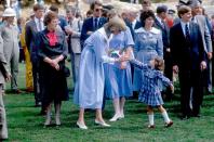 <p>A young girl offers Diana a flower during an event in Adelaide.<br></p>