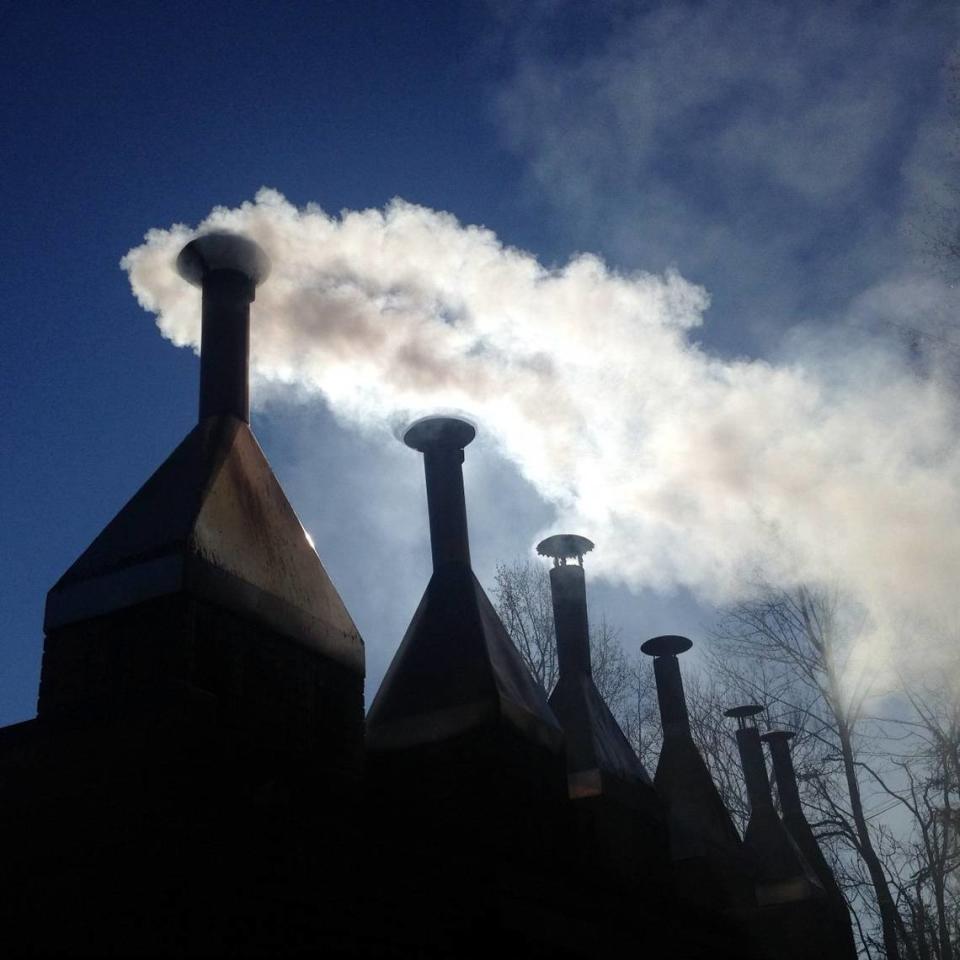 Smoke billows from cookers at Lexington Barbecue.