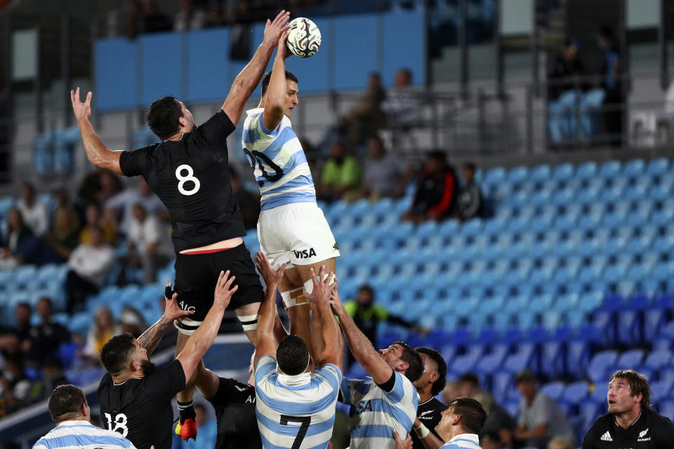 Argentina's Juan Martin Gonzalez, top right, wins a line out against New Zealand's Luke Jacobson during their Rugby Championship match on Sunday, Sept. 12, 2021, on the Gold Coast, Australia. (AP Photo/Tertius Pickard)