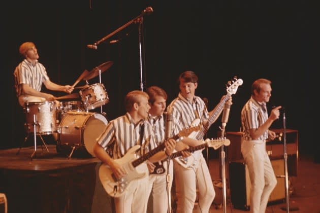 The Beach Boys performing in 1964. - Credit: Michael Ochs Archives via Walt Disney Studios