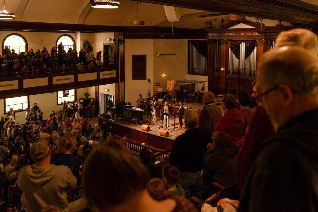 Students leading worship inside Hughes Chapel on the campus of Asbury University in Wilmore, Ky., on Feb. 17, 2023. (Jesse Barber/The New York Times)