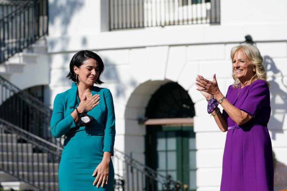 First lady Jill Biden, right, applauds 2021 National Teacher of the Year Juliana Urtubey, left, a bilingual special education teacher in Las Vegas, during an event with 2020 and 2021 State and National Teachers of the Year on the South Lawn of the White House in Washington, Monday, Oct. 18. - Credit: AP