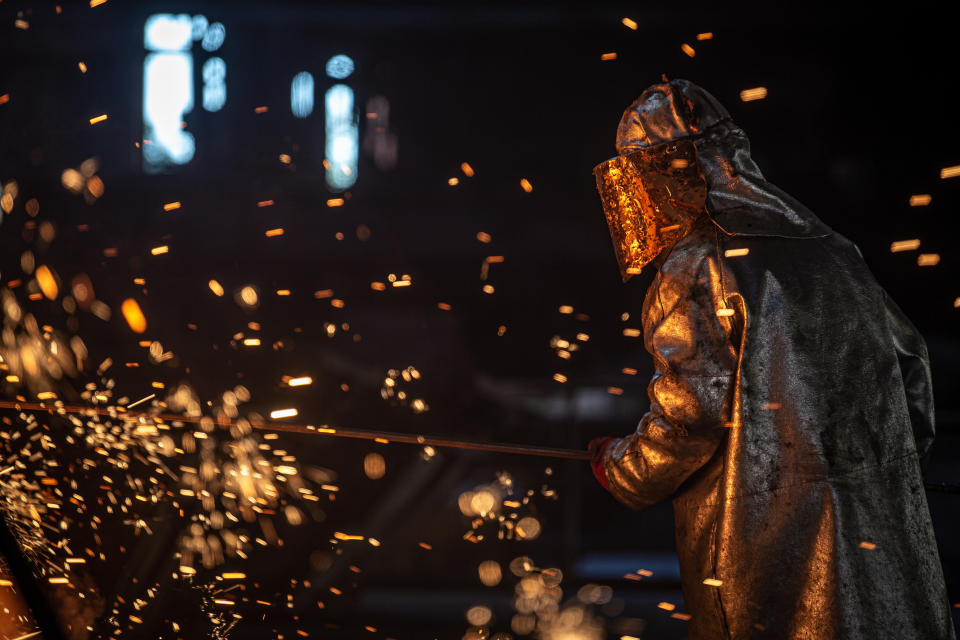 OSTRAVA, CZECH REPUBLIC - SEPTEMBER 8: A worker operates in the blast furnace at Liberty steel as Blast Furnace No. 2. which has been temporarily shut down due to a drop in demand following the coronavirus (Covid-19) pandemic, resumes working in Ostrava, Czech Republic on September 8, 2020. Liberty Ostrava a.s., part of the Liberty Steel group, is a global steel and mining company. Liberty Ostrava has an annual production capacity of 2 million tonnes of steel. Besides the Czech market, the company sells its products to more than 40 countries around the world. (Photo by Lukas Kabon/Anadolu Agency via Getty Images)