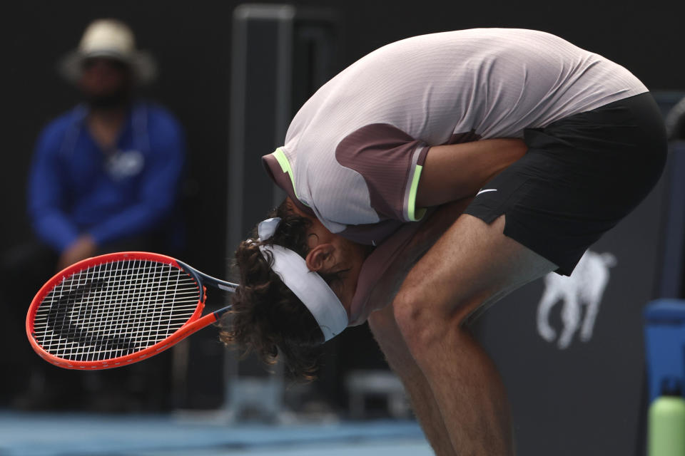 Taylor Fritz of the U.S. reacts during his quarterfinal against Novak Djokovic of Serbia at the Australian Open tennis championships at Melbourne Park, Melbourne, Australia, Tuesday, Jan. 23, 2024. (AP Photo/Asanka Brendon Ratnayake)