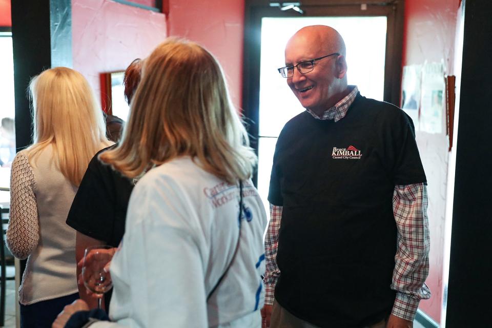 Carmel city council member Bruce Kimball greets supporters and friends at an election watch party for Carmel Republican candidates at DonatelloÕs Italian Restaurant in Carmel, Ind., Tuesday, May 7, 2019.