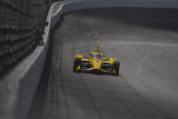 Scott McLaughlin, of New Zealand, drives into Turn 2 during qualifying for the Indianapolis 500 auto race at Indianapolis Motor Speedway in Indianapolis, Sunday, May 19, 2024. (AP Photo/Michael Conroy)