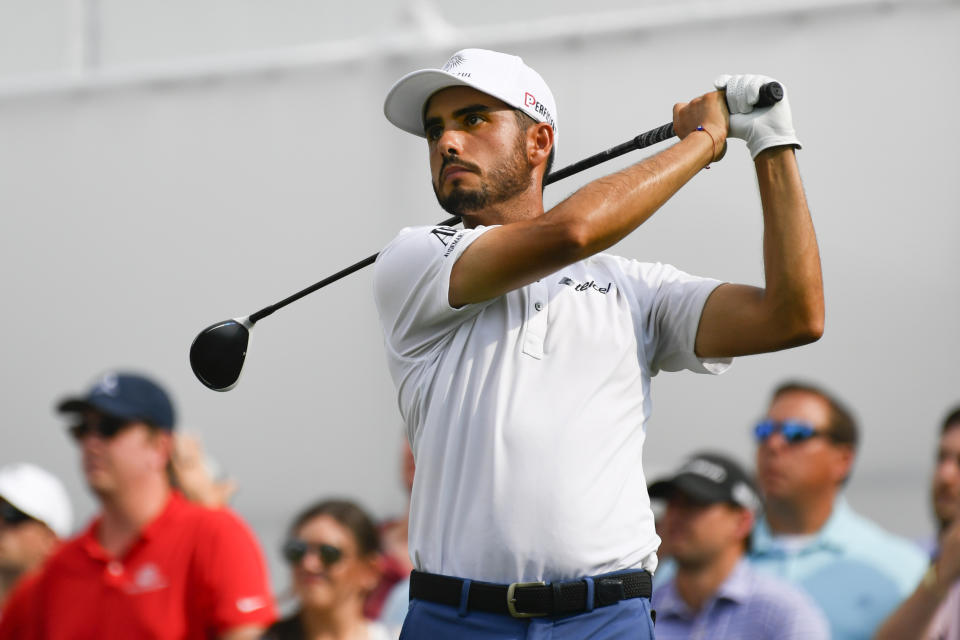 Abraham Ancer hits off the 18th tee during the final round in the World Golf Championship-FedEx St. Jude Invitational tournament, Sunday, Aug. 8, 2021, in Memphis, Tenn. Ancer won in a second playoff. (AP Photo/John Amis)