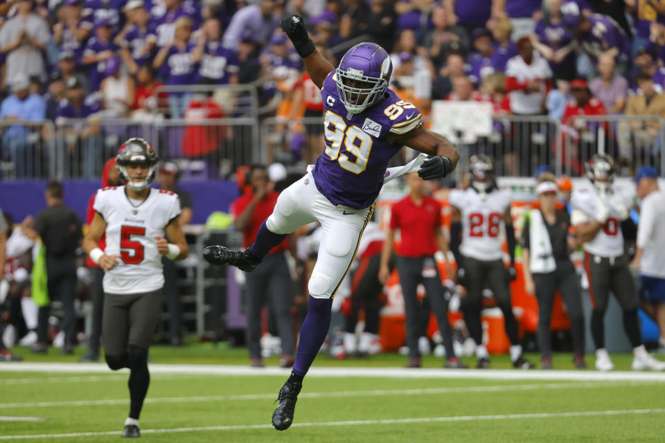 Minnesota Vikings linebacker Danielle Hunter (99) celebrates after a sack during the first half of an NFL football game against the Tampa Bay Buccaneers, Sunday, Sept. 10, 2023, in Minneapolis. (AP Photo/Bruce Kluckhohn)