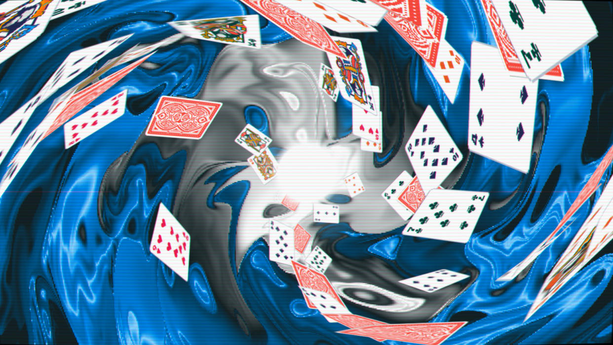  Cards swirl in an interdimensional vortex in Balatro's trippy intro sequence. 