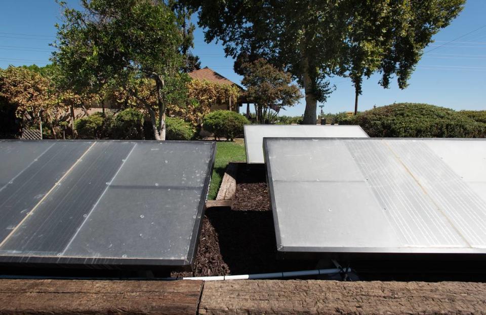 Hydropanels, which trap water vapor from the air, are being used in a pilot program to make safe drinking water at a home in Stanislaus County with high levels of nitrates in its well water. Photographed in Keyes, Calif., on Tuesday, August 3, 2022.