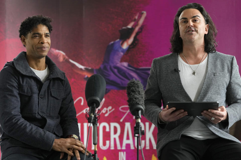 International ballet superstar Carlos Acosta, left, and Stephen Crocker, CEO of Norwich Theatre Royal, right, speak at a presentation for media about the brand-new production 'Nutcracker in Havana' at the Carlos Acosta Dance Studios in London, Monday, March 4, 2024. Nutcracker in Havana will have its world premiere on Nov. 1, 2024 at Norwich Theatre Royal, before embarking on a UK tour including a week at London's Southbank Centre in Dec. 2024, with further venues to be announced. (AP Photo/Kirsty Wigglesworth)