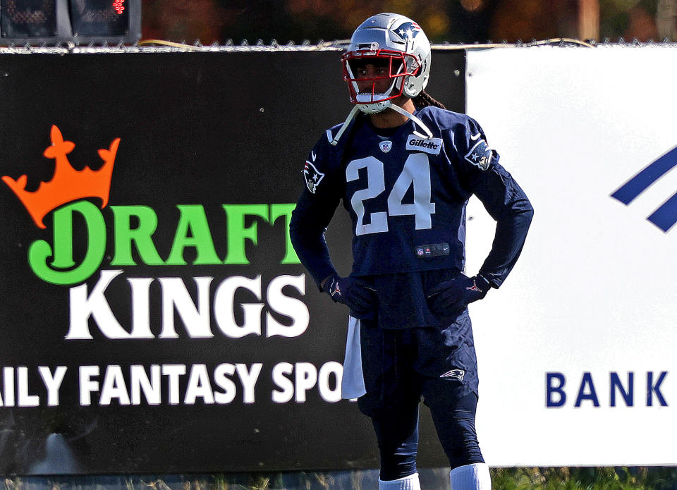 New England Patriots cornerback Stephon Gilmore stands in front of a DraftKings sign during a practice session in Foxborough, MA on Oct. 22, 2020. (Photo by Barry Chin/The Boston Globe via Getty Images)