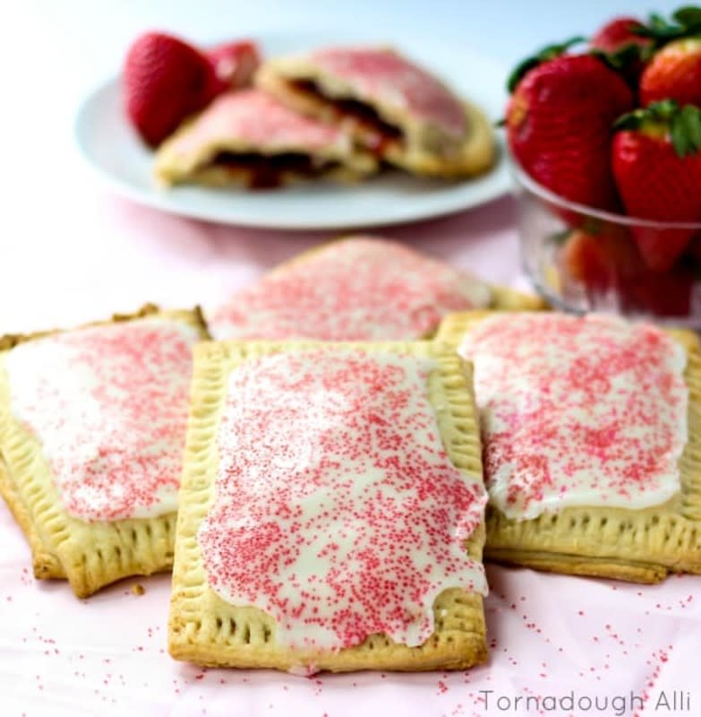 <p>Tournadough Alli</p><p>Want to make your favorite childhood snack at home? These homemade strawberry pop-tarts are super easy, filled with strawberry jam and glazed to perfection.</p><p><strong>Get the recipe: <a href="https://tornadoughalli.com/strawberry-pop-tarts/" rel="nofollow noopener" target="_blank" data-ylk="slk:Homemade Strawberry Pop Tarts;elm:context_link;itc:0;sec:content-canvas" class="link rapid-noclick-resp"><em>Homemade Strawberry Pop Tarts</em></a></strong></p>