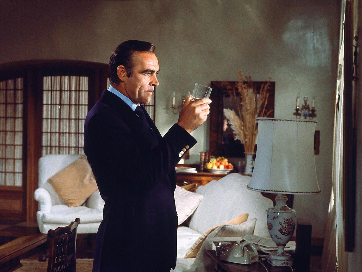Sean Connery in 'Diamonds Are Forever' with an essential scotch (Photo by Danjaq/EON/UA/Kobal/REX)