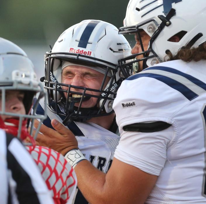 Brody Pumneo, left, of Fairless celebrates his touchdown with Dominic Ehmer, right, during to their game at Sandy Valley on Thursday, August 18, 2022.